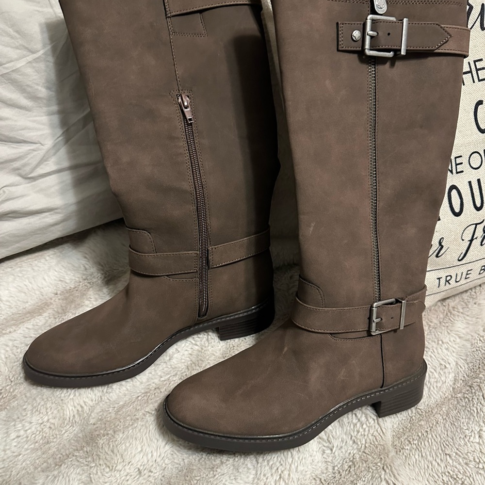 Brown knee length boots. Never worn.